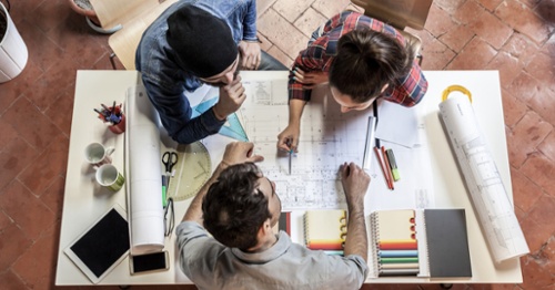 Architects at drafting table