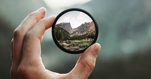 Using a lens to magnify and focus