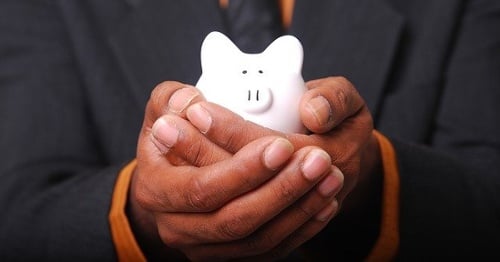 Holding Piggy Bank | CSG Partners