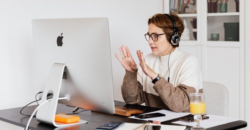 Woman watching ESOP webinar