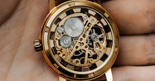 Close up of watch gears.